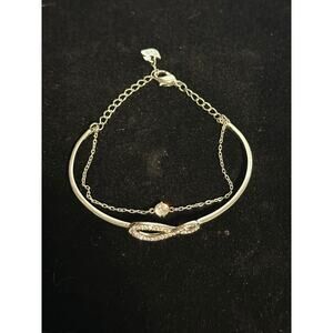 SWAROVSKI Hyperbola bangle Infinity, White, Rhodium plated